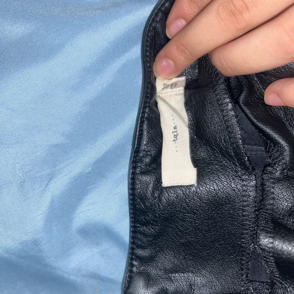 Form fitting leather skirt with buttons